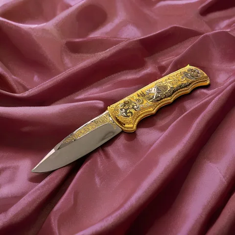 Золотой складной нож «Пара волков» — необычный подарок